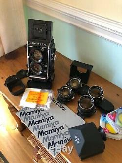 Mamiya C330f camera with 80mm, 55mm, 135mm lens, Prism finder & Instruction Book