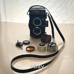 Yashica Mat 124 G with case, strap, filter, and two sets close up filters